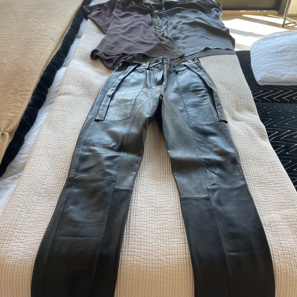 Great black and olive faux leather pants.  Worn only one time.